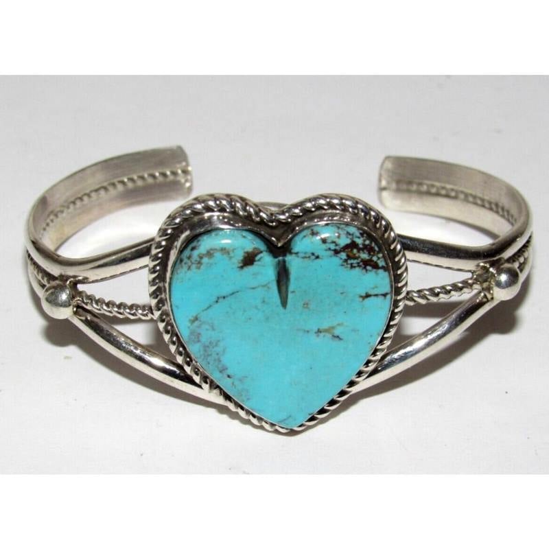 Navajo Kingman Turquoise Heart Cuff Bracelet Marcella James Native American: Phenomenal Native American Navajo sterling silver, Kingman turquoise heart bracelet by the Navajo artist Marcella James. Stunning statement piece, will fit a 6.5"-7" wrist. Can be carefully adjusted. 