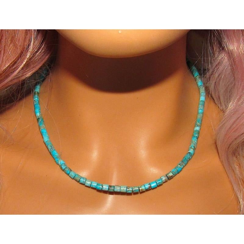 Navajo Rolled Turquoise Heishi Choker Necklace Native American 16L: Stunning Navajo Kingman turquoise small rolled heishi beads choker necklace with sterling silver clasp. Measures about 16" long. Rolled turquoise bead color and matrix vary slightly. Gorgeous, elegant