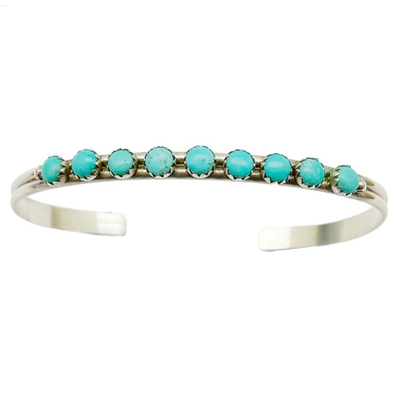 Zuni Snake Eye Turquoise Stacker Cuff Bracelet Sterling Silver: Fab classic Native American Zuni sterling silver and Sleeping Beauty mine snake eye turquoise cuff bracelet by A. Wallace. Dainty cuff bracelet with a traditional Snake eye turquoise design on the fro