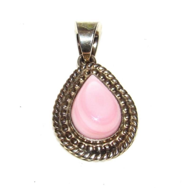 Navajo Pink Conch Pendant B Begay Sterling Silver: Stunning Navajo Pink Conch Pendant B Begay Sterling Silver. Singed, marked "sterling" on the back. The pendant measures about 1". Fab classic Native Navajo piece to add to any jewelry collection!