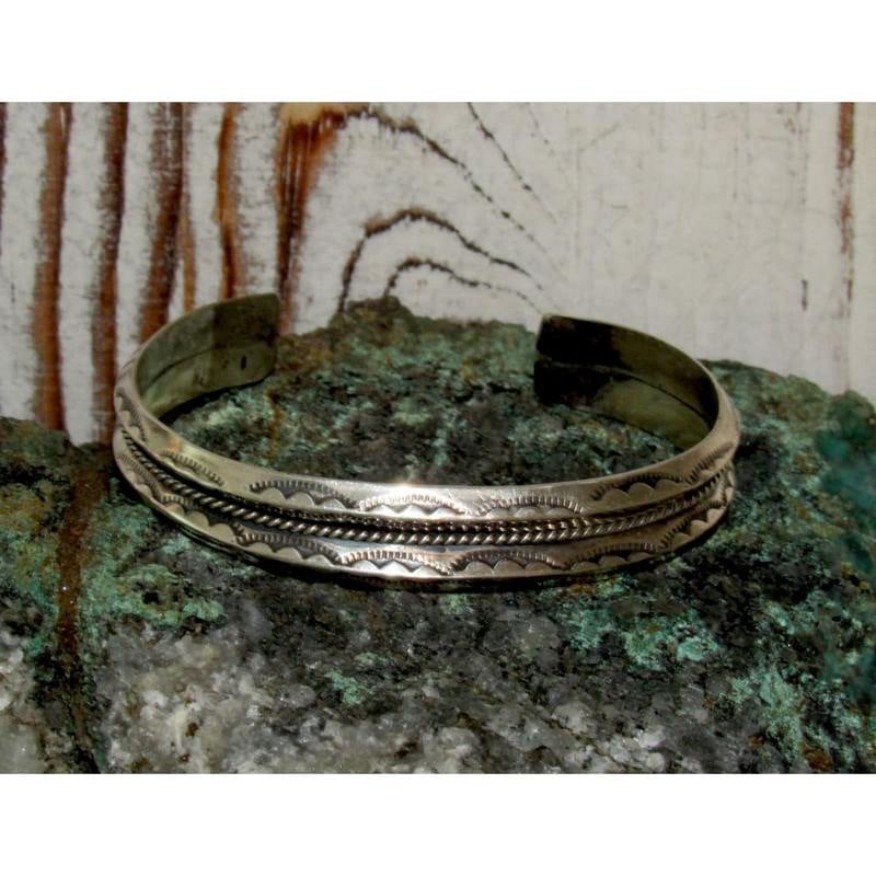 Navajo Sterling Silver Carinated Stacker Cuff Bracelet Ingot Rob Cadman: Phenomenal sterling silver Native American Navajo carinated stacker cuff bracelet by the Navajo artist Rob Cadman. Wonderful craftsmanship and attention to detail, intricately hand stamped tribal desi