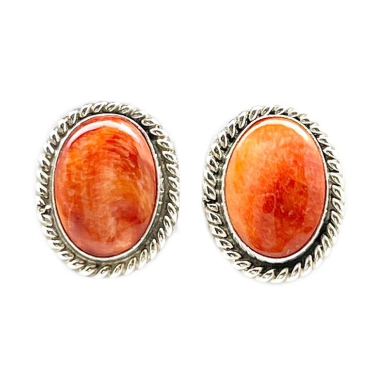 Navajo Orange Spiny Post Earrings Sterling Silver J. Frank: Classic Navajo sterling silver and orange spiny post stud earrings by the Navajo artist J. Frank. The earrings measure about 1/2" and feature a traditional post design in sterling silver. Fab classic