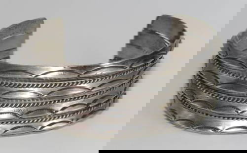 Navajo Sterling Silver Carinated Stacker Cuff Bracelet Ingot Rob Cadman: Phenomenal sterling silver Native American Navajo carinated stacker cuff bracelet by the Navajo artist Rob Cadman. Wonderful craftsmanship and attention to detail, intricately hand stamped tribal desi
