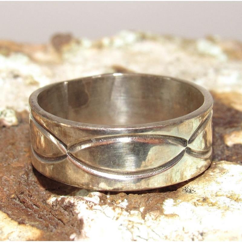 Navajo Band Ring Size 8.5 Sterling Silver Ingot Band Rob Cadman: Native American Navajo sterling silver ingot hand etched and stamped tribal design band ring by the Navajo artist Rob Cadman. The ring is size 8.5. Wonderful example of classic, wearable Native Americ