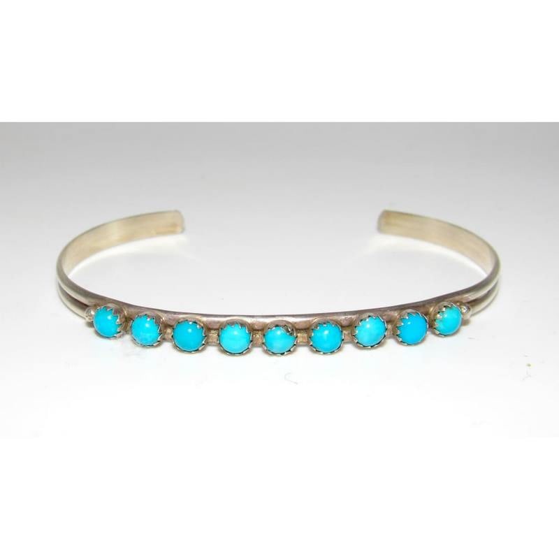 Zuni Snake Eye Turquoise Stacker Cuff Bracelet Sterling Silver: Fab classic Native American Zuni sterling silver and Sleeping Beauty mine snake eye turquoise cuff bracelet by A. Wallace. Dainty cuff bracelet with a traditional Snake eye turquoise design on the fro
