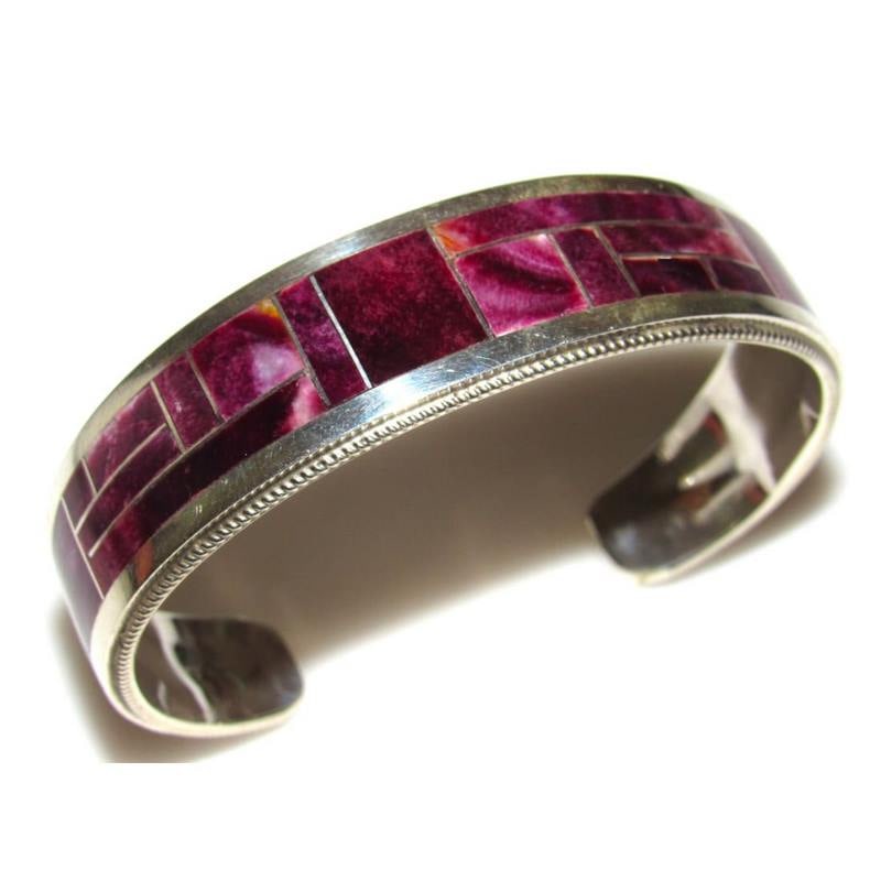Navajo Purple Spiny Inlay Stacker Cuff Bracelet Sterling R. Begay: Fab Native American Navajo sterling silver and purple spiny oyster inlay cuff bracelet by the Navajo artist Reginda Begay.. Traditional inlay design of gorgeous purple spiny in sterling silver. Great 