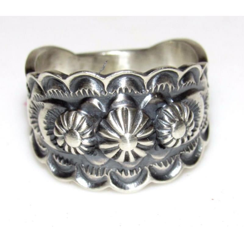 Navajo Band Ring Size 8 Sterling Silver Repousse Band Signed Bennie Ramone: Gorgeous Native American Navajo sterling silver intricately hand etched and stamped tribal design band ring with repousse accents on the front. Collectible Navajo artist Bennie Ramone. Wonderful craft