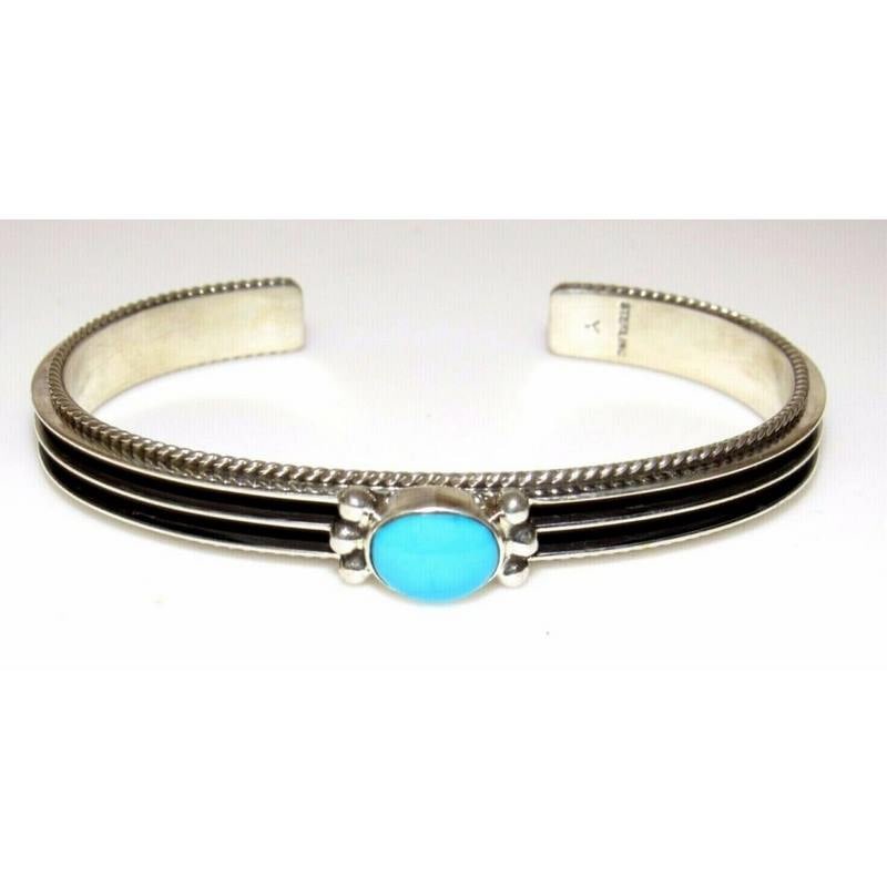 Navajo Sterling Turquoise Stacker Bracelet D. Yazzie Native American: Stunning Native American Navajo sterling silver and Sleeping Beauty turquoise cuff bracelet by the Navajo artist D. Yazzie. The inside circumference is about 6.5"" including the gap. The gap is about 