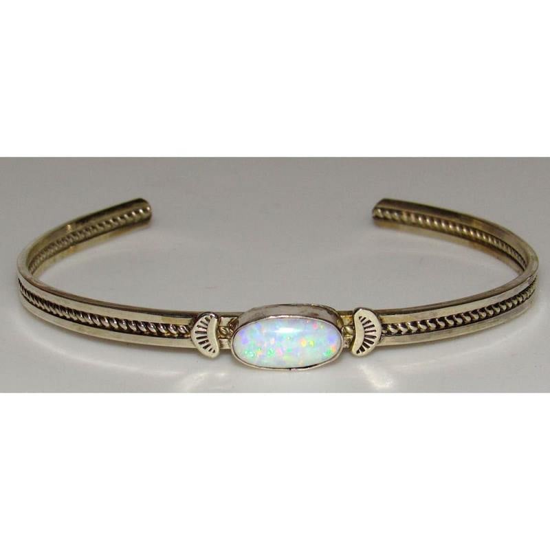 Navajo Opal Bracelet Stacker Sterling Silver Cuff Native American Signed: For your consideration is this fab vintage Navajo sterling silver and opalstacker cuff bracelet. The cuff features a traditional, elegant design insterling silver accented with a beautiful opal caboch