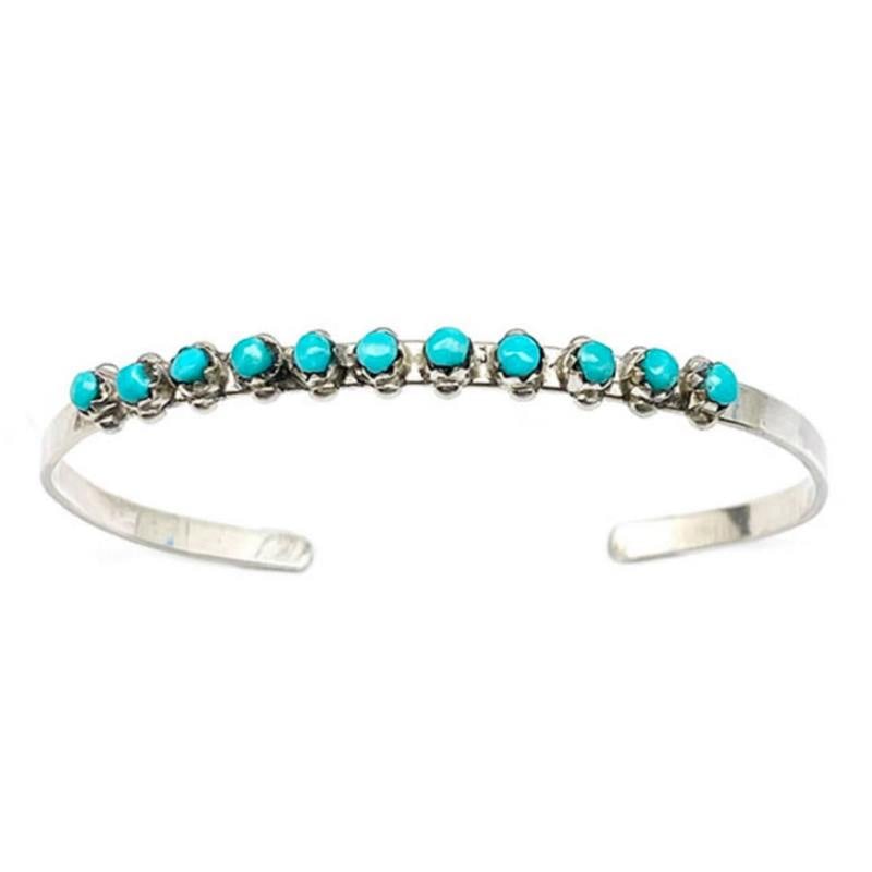 Zuni Snake Eye Turquoise Stacker Cuff Bracelet Sterling Silver: Fab classic Native American Zuni sterling silver and Sleeping Beauty mine snake eye turquoise cuff bracelet by A. Wallace. Dainty cuff bracelet with a traditional Snake eye turquoise design on the fro