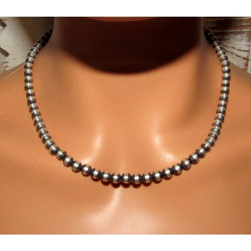 Navajo Pearls Necklace Sterling Silver 6mm Beads Necklace 18"L Choker: Classic Navajo pearls necklace with 6mm sterling silver beads design by the Navajo artist M Lee. Hook & eye closure. Measures 18" long. Gorgeous, elegant & timeless necklace that is sure to complement