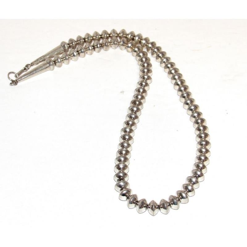 Vintage Navajo Pearls Necklace 10mm Hand Stamped Saucer Beads Sterling Silver: Phenomenal classic Navajo pearls necklace. Hand etched 10mm saucer beads strung on a foxtail chain. The sterling saucer beads measure about 10mm. The necklace measures about 22" long and feature a hoo