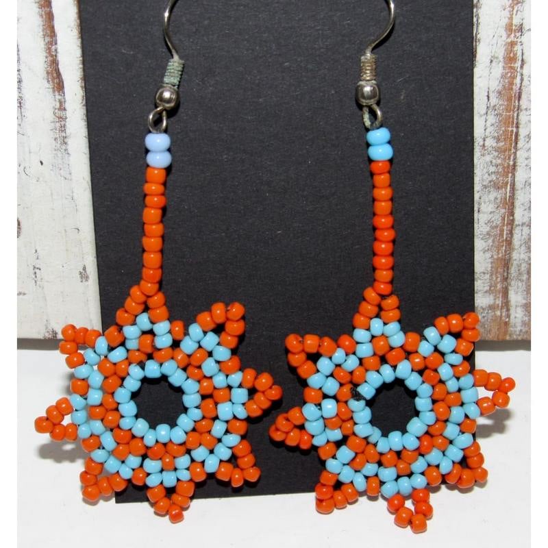 Vintage Native American Beaded Dangle Earrings: Stunning vintage Native American Plain Tribes beaded dangle earrings. The earrings are dangle hoop type with French hooks and measure about 2 1/4" total length. Fab, elegant earrings that are sure to 