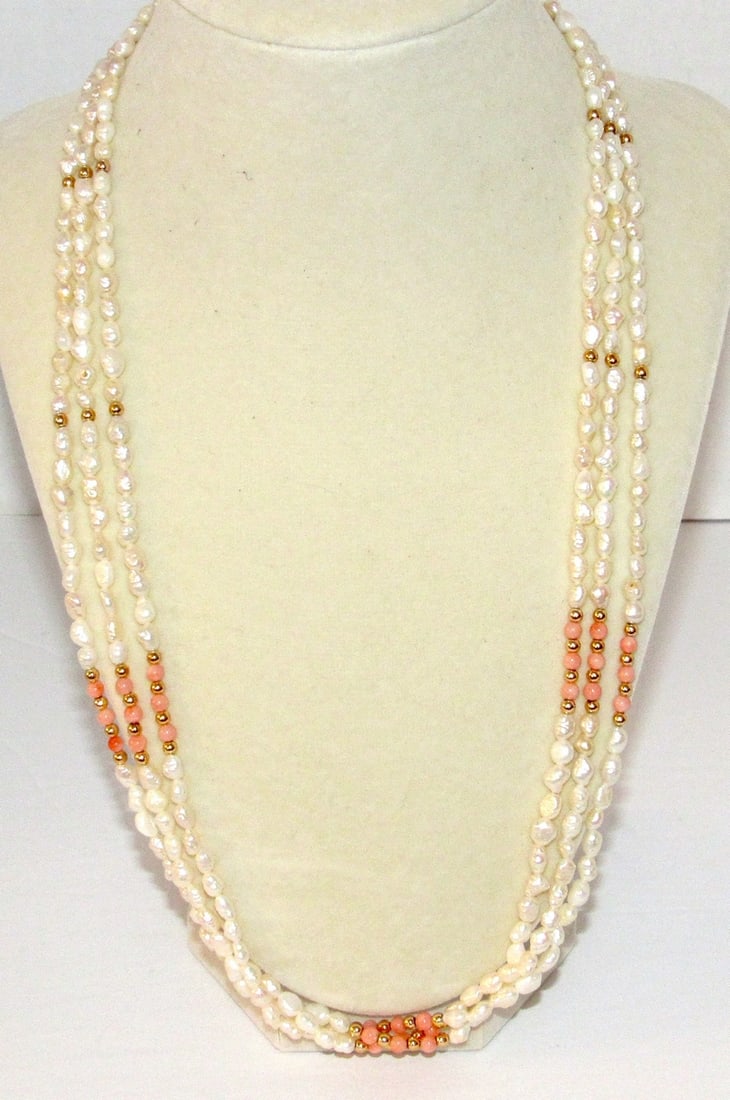 Pearl Necklace with Angel Skin Coral and Golden Beads Accents: Pearl Necklace with Angel Skin Coral and Golden Beads Accents. The necklace measures 24" long. FREE US SHIPPING ON ALL JEWELRY! Condition Good Buyer's Premium 20% FREE SHIPPING ON ALL JEWELRY ORDERS W