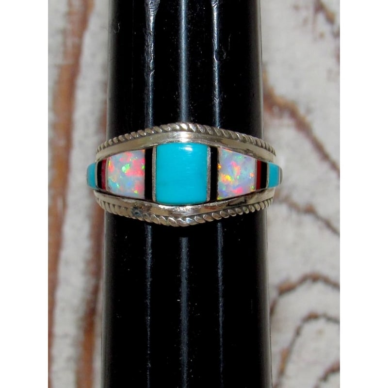 Zuni Turquoise Opal Jet Inlay Ring Sz 8 Sterling Silver D. Panteah: For your consideration is this traditional Native American Zuni sterling silver and turquoise, opal, jet inlay ring in size 8.It measures just under 1/2" wide at top and tapers down. Inlay is only on