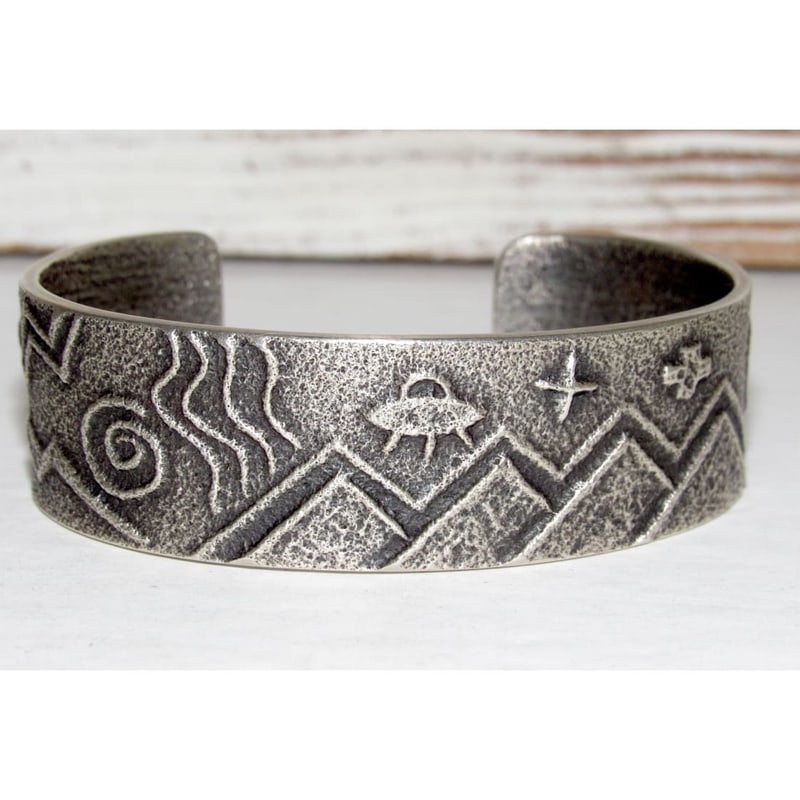Navajo Monty Claw Tufa Cast Sterling Silver Cuff Bracelet: Exceptional sterling silver cuff bracelet by award-winning Native American artist Monty Claw, known for his contemporary approach to traditional symbolism and bold textural silverwork. This highly col