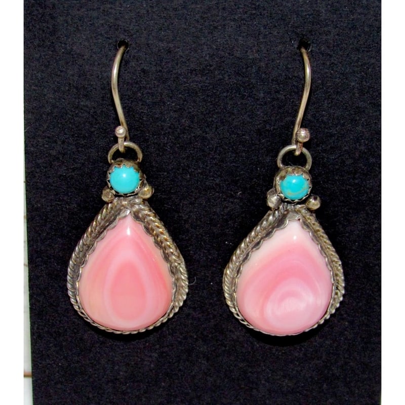 Navajo Pink Conch Turquoise Dangle Earrings Sterling Silver Signed: Navajo sterling silver earrings, pink conch and turquoise dangle by the Navajo artist. It measures a little under 1 1/2" long with sterling silver French wires. Signed by the artist, stamped on the ba