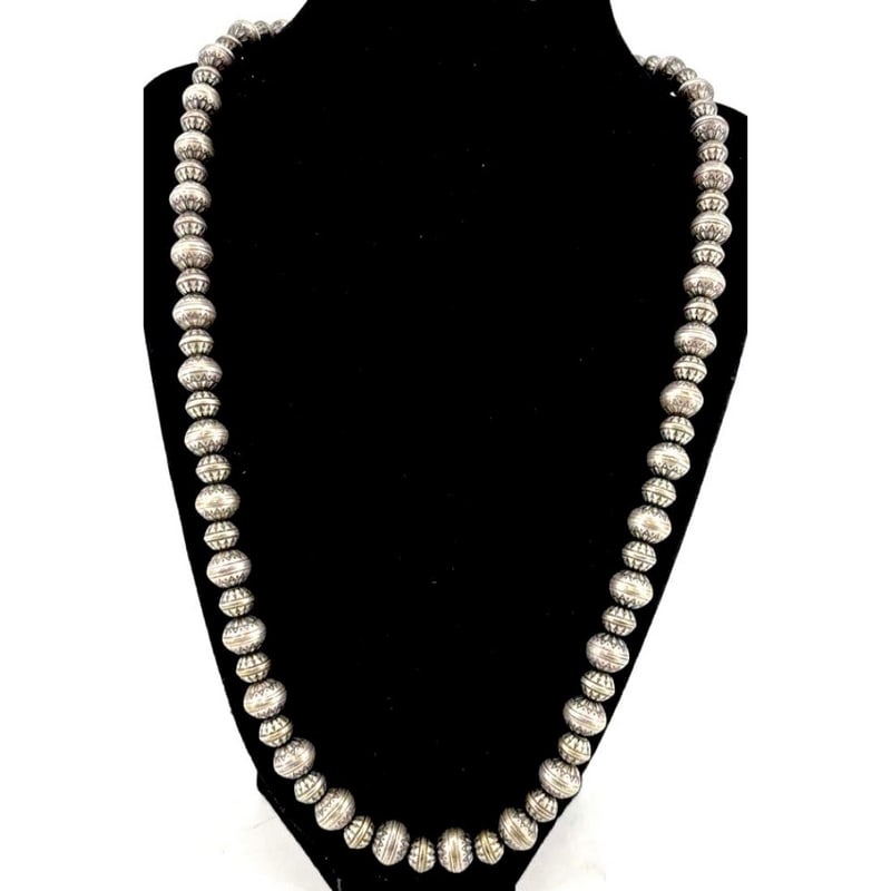 Vintage Navajo Pearls Necklace Graduated Saucer Beads Sterling Silver 22"L: Vintage Navajo Pearls sterling silver necklace, featuring classic hand-strung saucer beads with traditional Navajo stamping and natural patina developed over time. This authentic Southwestern necklace