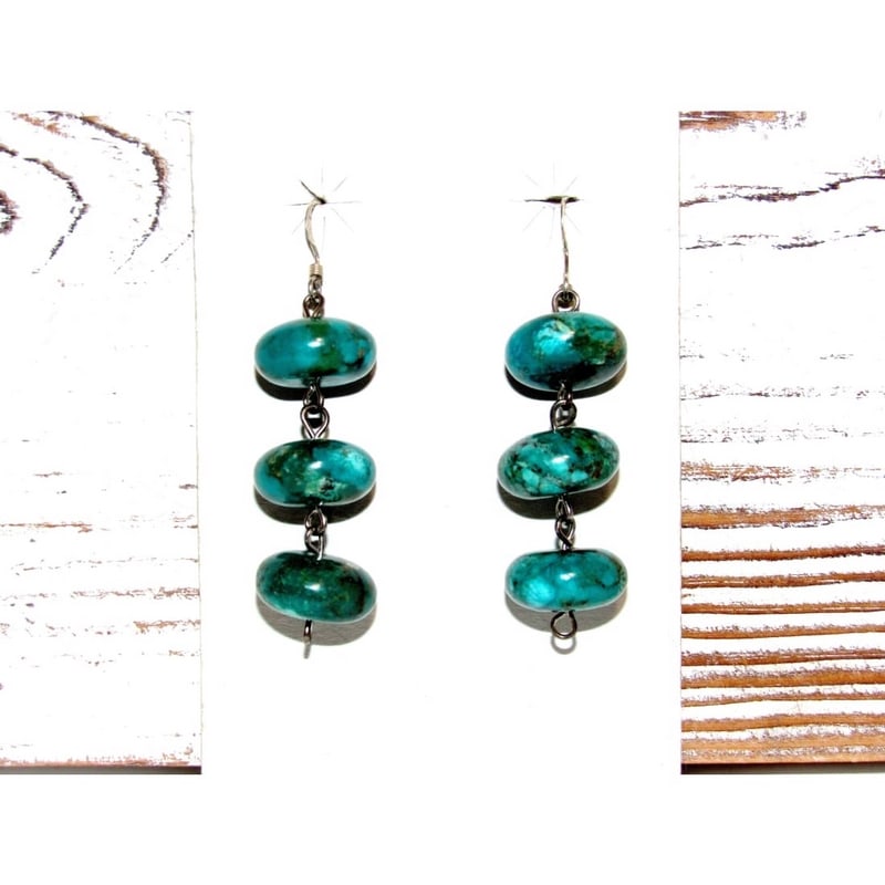 Navajo Rolled Turquoise & Sterling Beads Dangle Earrings: Stunning Navajo turquoise rolled beads and sterling silver hooks beads statement earrings by a Navajo artist. The earrings are dangle type with French hooks and measure about 2" long. Gorgeous, elegan