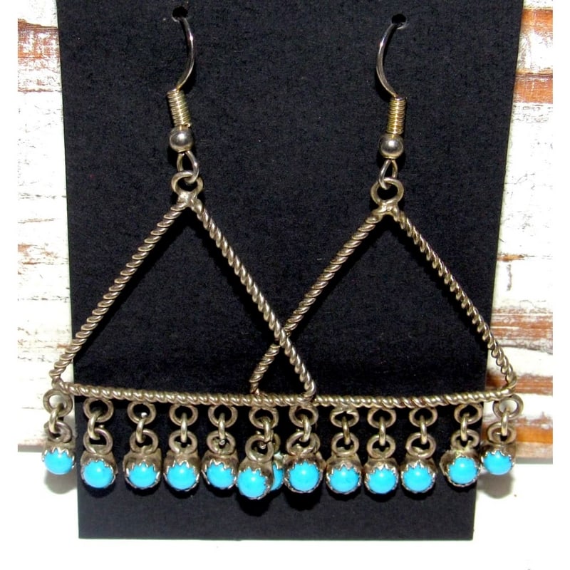 Vintage Zuni Snake Eye Turquoise Sterling Silver Dangle Earrings: Vintage Zuni Snake Eye Turquoise Sterling Silver Dangle Earrings. Stunning vintage Zuni sterling silver and "snake eye" turquoise dangle earrings in nice vintage condition. The earrings measure about