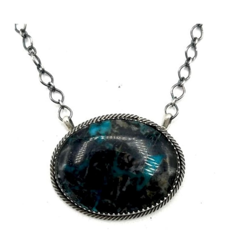 Navajo Blue Moon Turquoise Bar Necklace Sterling Silver T. Long: Navajo Blue Moon Turquoise Bar Necklace Sterling Silver T. Long. The necklace features a stunning and highly desirable Blue Moon turquoise cabochon delicately set in sterling silver, creating a mesmer