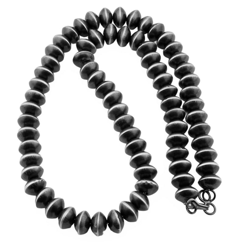 11mm Navajo Pearls Necklace Sterling Silver Saucer Beads Choker Necklace 20"L: Stunning 11mm sterling silver saucer beads Navajo pearls necklace by the Navajo artist Robert Begay. Measures about 20" long. Gorgeous, elegant & timeless piece that is sure to complement any outfit.