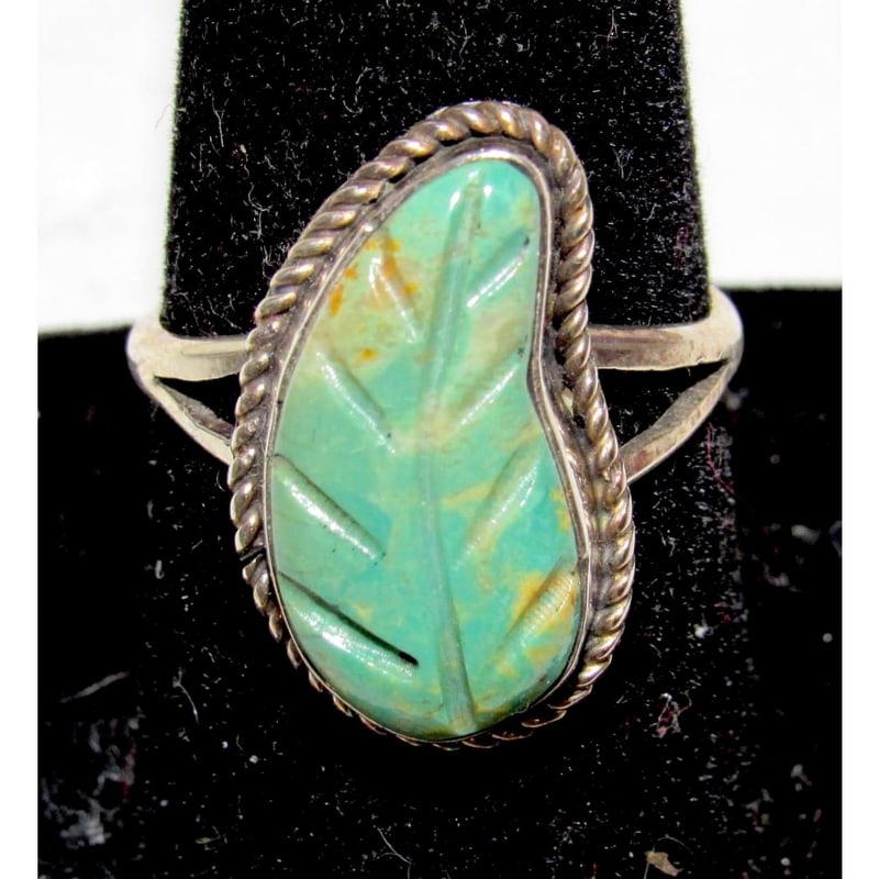 Zuni Carved Royston Turquoise Leaf Ring Size 8.5 Sterling Silver Native American: Spectacular Native American Zuni sterling silver, carved Royston turquoise leaf ring in size 8.5. The ring is about 1". Wonderful example of wearable Native American art.
