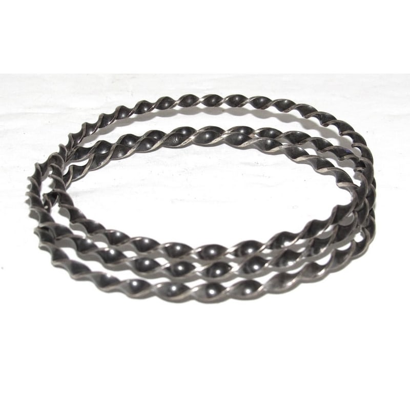 Vintage Taxco Mexico Silver Bangle Bracelets - Set of 3 Matching Silver Bangles: Vintage Taxco Mexico Silver Bangle Bracelets - Set of 3 Matching Silver Bangles. Set of Silver Taxco Mexico Bangle Bracelets with intricate twisted design. The set includes 3 matching bangle bracelets