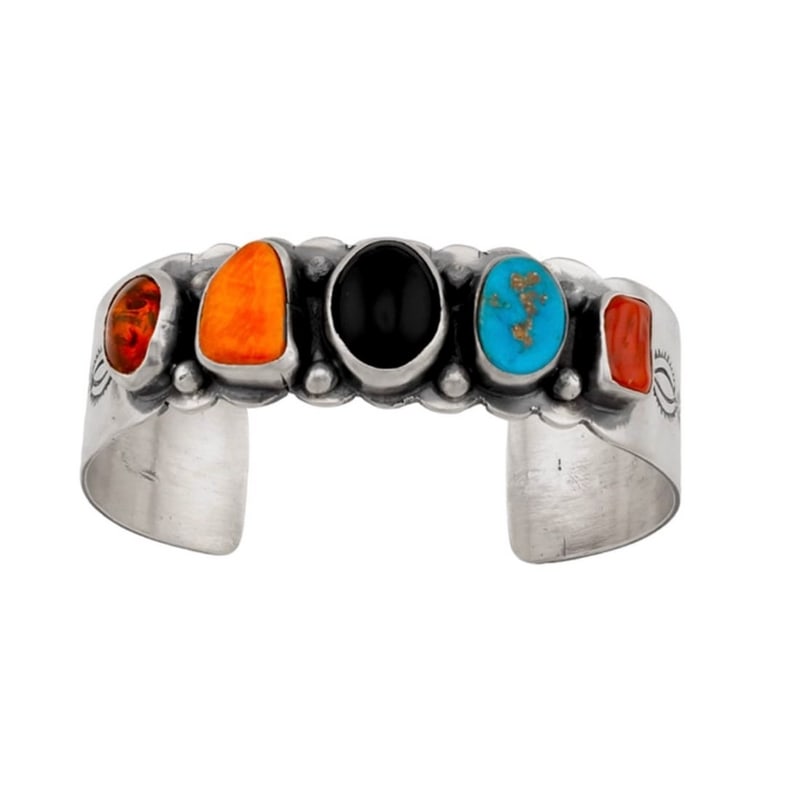 Navajo Sterling Silver Turquoise, Coral & Multi-Stone Cuff Bracelet J Begay: This stunning Navajo sterling silver cuff bracelet showcases a beautiful arrangement of five multi-color stones, including coral, Royston turquoise, black onyx, spiny oyster, and amber, each set in a