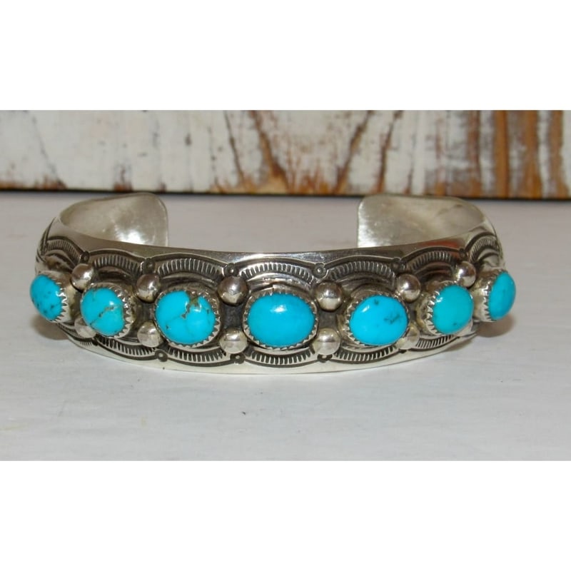 Navajo Blue Royston Turquoise Cluster Cuff Bracelet Sterling Silver Signed: For your consideration is this stunning example of Native American art. This fab bracelet features a beautiful hand etched traditional design in sterling silver accented with Blue Royston turquoise cl