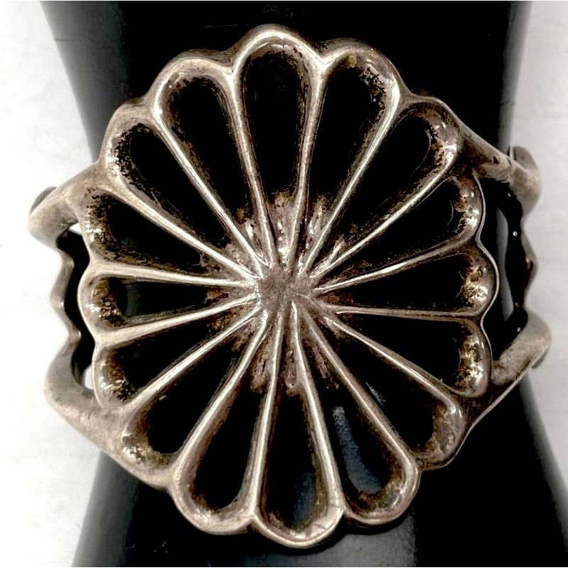 Early Navajo Sterling Silver Sand Cast Cuff Bracelet Vintage: Stunning early Navajo sterling silver sand-cast cuff bracelet with intricate design. Solid and well made, this vintage cuff has a beautiful aged patina and strong presence. Measures approximately 7" i