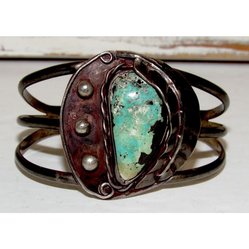 Old Pawn Navajo Cripple Creek Turquoise Bracelet Sterling Silver: Fine vintage mid-century Navajo Sterling Silver Blossom Bracelet with Cripple Creek TurquoiseExceptional collector-quality vintage Navajo sterling silver bracelet featuring a traditional Navajo blosso