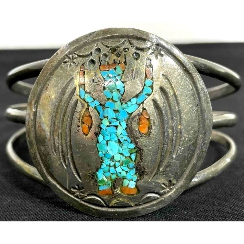Vintage Navajo Turquoise Coral Kachina Bracelet Sterling Silver Cuff: Phenomenal vintage Navajo collector bracelet. Intricately hand etched Apache crown dancer kachina design in sterling silver, accented with turquoise and coral and hand stamped designs around. Exceptio