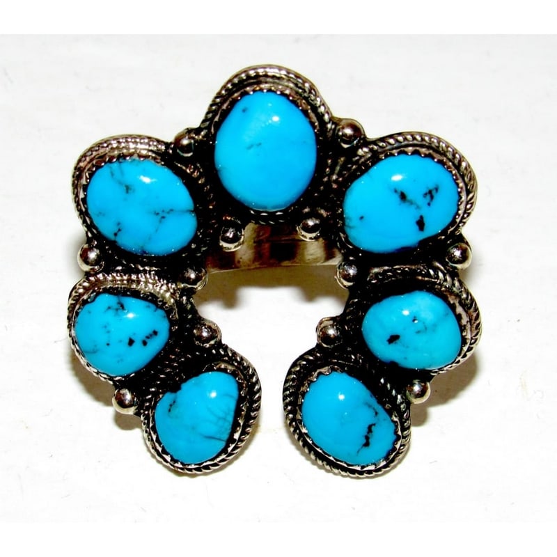 Navajo Naja Ring Size 8 Kingman Turquoise Statement Ring Native Signed: For your consideration is this stunning Navajo sterling silver, Kingman turquoise squash blossom naja design ring in size 8. Measures about 1.5" by 1.5" on the front. Signed by the artist, stamped ste
