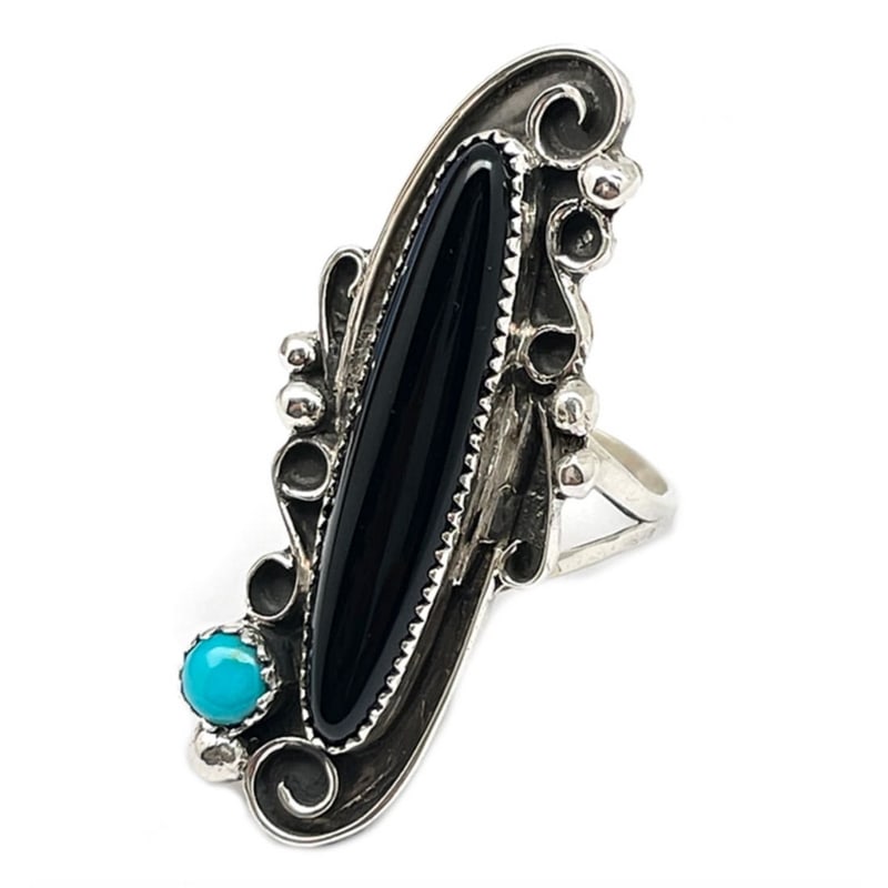 Navajo Ring Onyx Turquoise Sterling Silver Sz 8 Native American S. Yazzie Women: Navajo Sterling silver ladies ring with a black onyx stone and one turquoise cabochon, traditional Navajo blossom design. Top measures approximately 1 3/4" long by 3/4" wide. It is Navajo hand made by