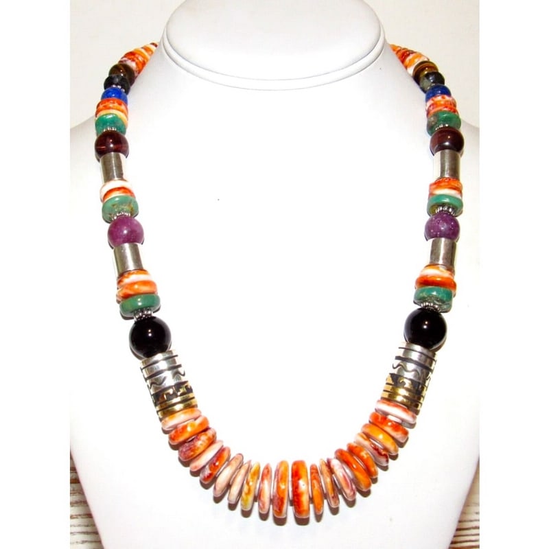 Navajo Tommy Singer Orange Spiny Heishi Necklace Sterling Silver 12K Gold 20": Phenomenal Navajo Tommy & Rosita Singer orange spiny oyster, sterling silver, 12K gold overlay, and semiprecious stones necklace including sugilite, tiger eye, turquoise, etc. The necklace is about 20