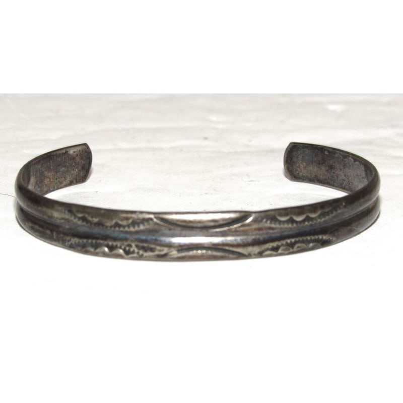 Old Pawn Navajo Stacker Cuff Bracelet Ingot Sterling Silver Native American: For your consideration is this classic example of vintage Navajo jewelry. The bracelet features a traditional cuff design in sterling silver accented with hand stamped ingot tribal design. Age appropr