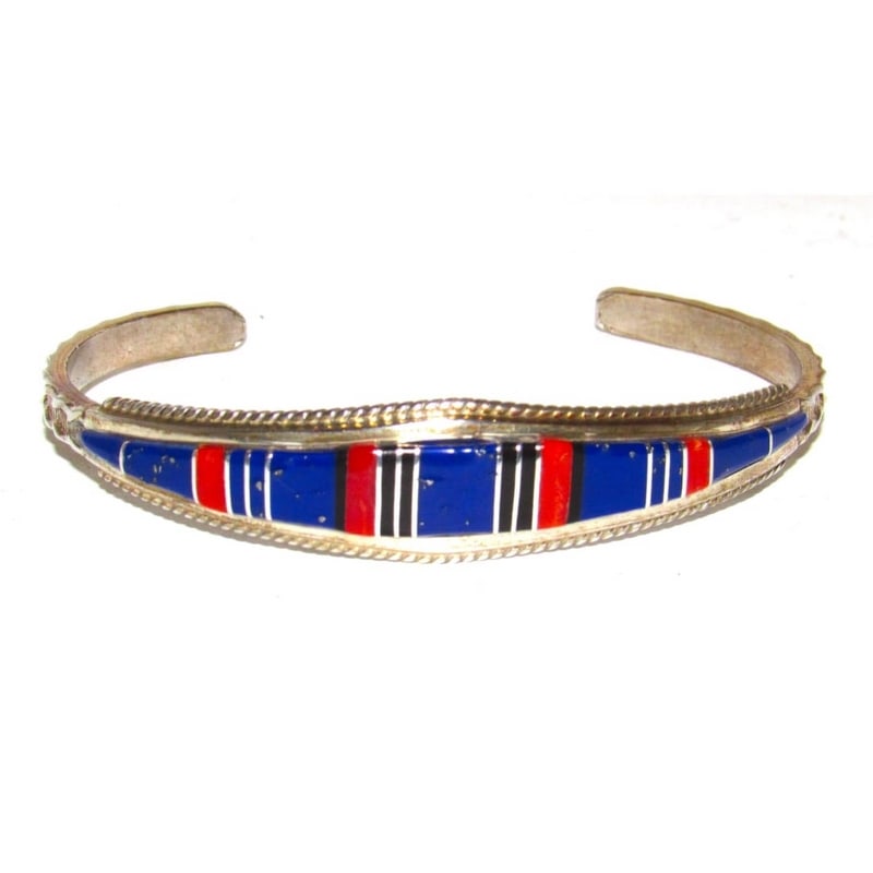 Zuni Inlay Lapis Coral Bracelet Sterling Native American D. Panteah: Fab Native American Zuni sterling silver and lapis, coral, jet, inlay cuff bracelet by Diedra Panteah. Sterling silver inlaid bracelet with traditional Zuni inlay design. It measures about 1/2" in the