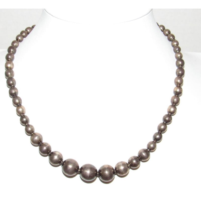 Pre-Eagle Taxco Mexico Sterling Silver Beads Necklace: Phenomenal vintage pre-Eagle Taxco Mexico sterling silver beads necklace. The necklace features a classic one strand design. The necklace measures 17" long and features a hook & eye closure. Stamped o