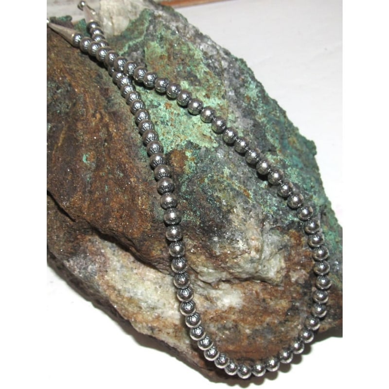 6mm Navajo Pearls Necklace Sterling Silver Stamped Beads Necklace 18"L: Stunning 6mm sterling silver stamped tribal design beads Navajo pearls choker necklace. Measures about 18" long. Gorgeous, elegant & timeless piece that is sure to complement any outfit. Wonderful gif