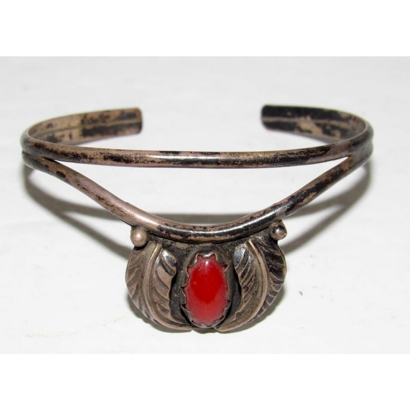 Old Pawn Navajo Coral Squash Blossom Cuff Bracelet Sterling Silver: Vintage Navajo sterling silver coral cuff bracelet featuring a classic squash blossom design. This handcrafted Native American cuff showcases a rich red coral cabochon set in sterling silver, with tra