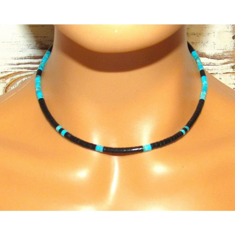 Navajo Rolled Jet & Turquoise Heishi Choker Necklace Native American 16"L: Stunning Navajo black jet & Kingman turquoise rolled heishi beads choker necklace with sterling silver clasp by the Navajo artist M. Calabaza. Measures about 16" long. Gorgeous, elegant piece that is 