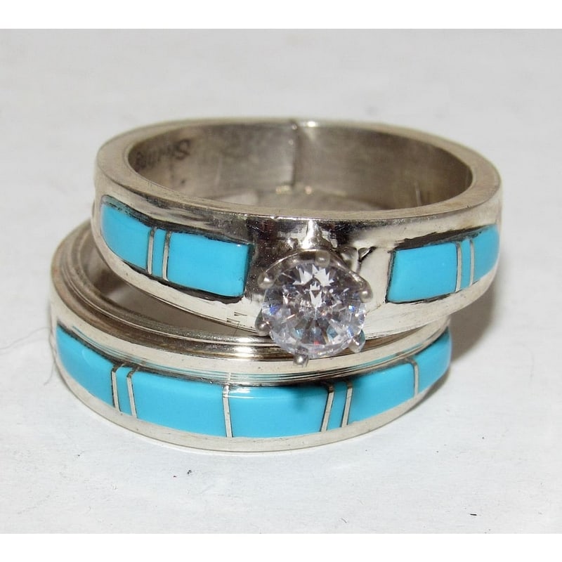 Native American Sterling Silver Navajo Handmade Turquoise Wedding Set Size 9: Stunning Navajo sterling silver & Sleeping Beauty mine turquoise wedding rings set with a cubic zirconia in size 9. Both rings are inlaid with Sleeping Beauty turquoise on the top. Inlay pattern may s