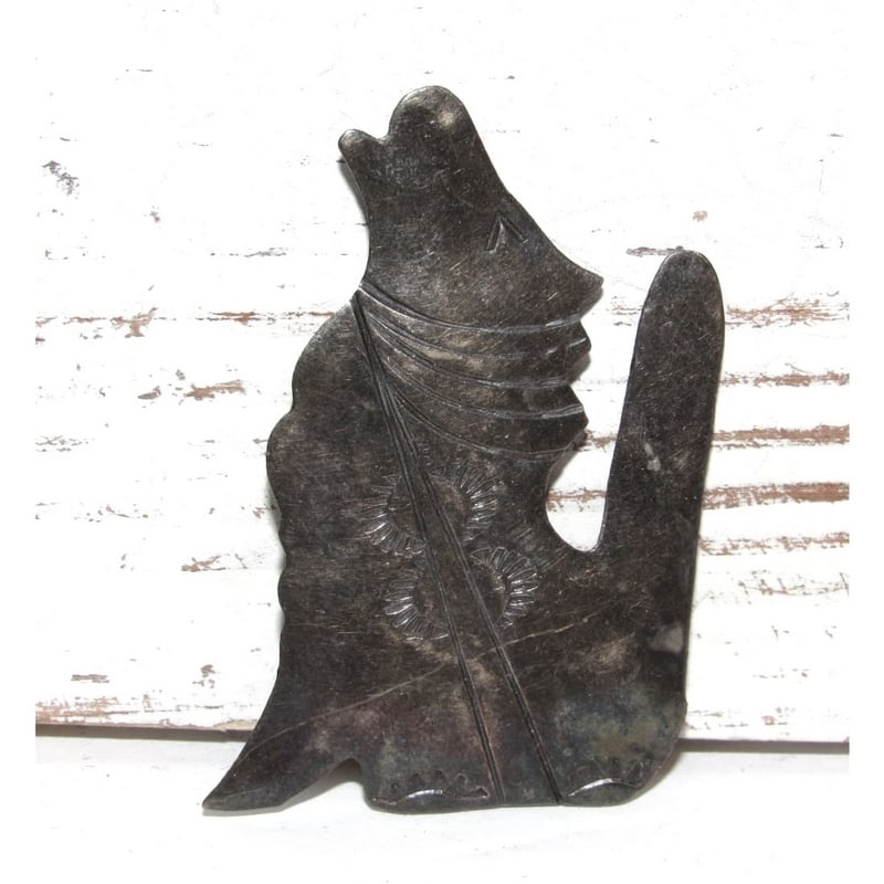 Vintage Taxco Mexican Silver Coyote Brooch Pin: Vintage Taxco silver brooch depicting a stylized coyote rendered in a bold, sculptural form with hand-engraved details. The design reflects mid-century Mexican modernist aesthetics commonly associated