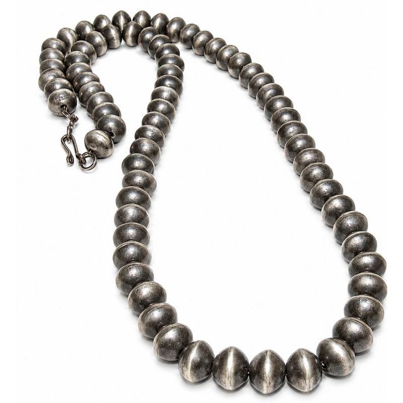 10mm Navajo Pearls Necklace Sterling Silver Saucer Beads Necklace 24" V. Tso: 10mm Navajo Pearls Necklace Sterling Silver Saucer Beads Necklace 24" V. Tso. Stunning 10mm sterling silver saucer beads Navajo pearls necklace by the Navajo artist Virginia Tso. Measures about 24" lo