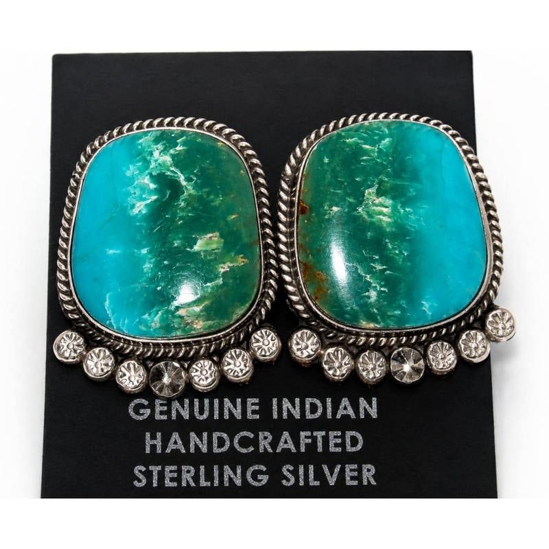 Navajo Gem Grade Royston Turquoise Post Earrings P. Yazzie: Navajo Gem Grade Royston Turquoise Post Earrings P. Yazzie. Experience the timeless elegance of our Navajo Sterling Silver and Gem Grade Royston Turquoise Post Earrings, masterfully crafted by Navajo 