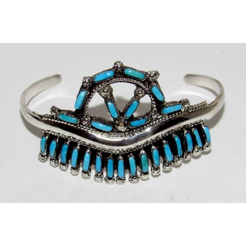 Vintage Zuni Petit Point Turquoise Cuff Bracelet Sterling Silver: Stunning vintage Zuni sterling silver and petit point turquoise cuff bracelet. The cuff features a unique hand etched design in silver setting with "petit point" turquoise cabochons.Measurements: 6 1/