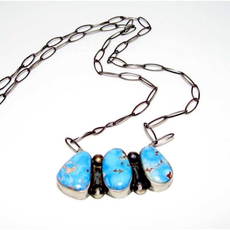 Navajo Golden Hills Turquoise Cluster Bar Necklace Sterling Silver S Skeets: The Navajo Golden Hills turquoise necklace offers a unique touch to any collection. Handcrafted by skilled artisans, this piece showcases remarkable turquoise stones. Each stone stands out with distin