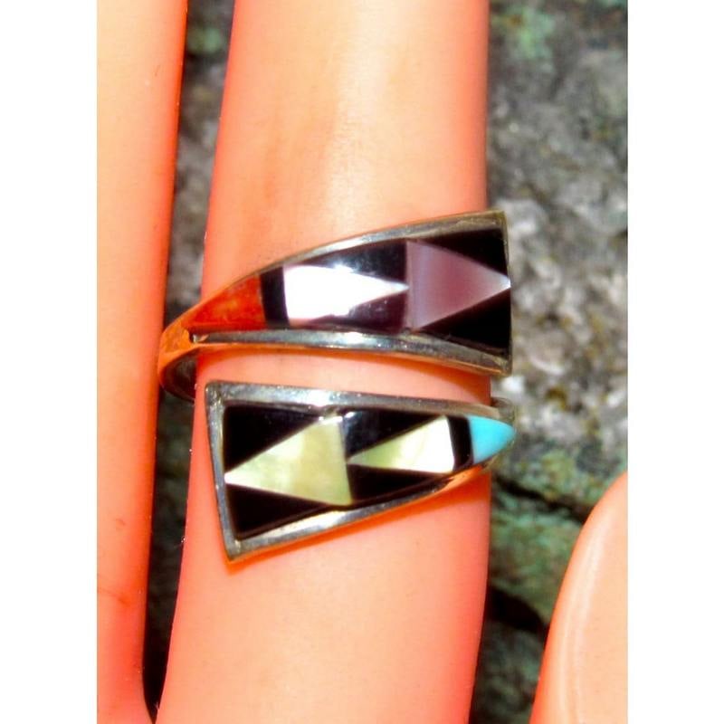Zuni Turquoise Coral Inlay Adjustable Ring Sz 7 Sterling Silver T. Qualo: Zuni Turquoise Coral Inlay Adjustable Ring Sz 7 Sterling Silver T. Qualo. Signed by the artist, stamped sterling. Adjustable ring, traditional Zuni inlay of Mother of Pearl, Jet, Coral, and Turquoise.