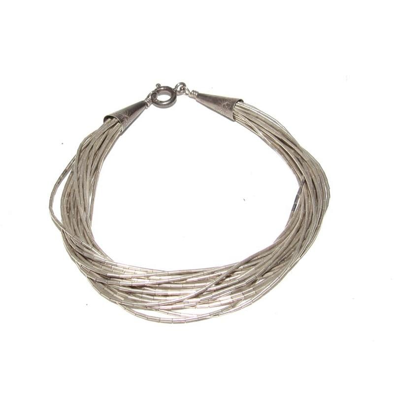 Vintage Navajo Liquid Sterling Silver Bracelet Multi Strand Design: Vintage Navajo Liquid Sterling Silver Bracelet Multi Strand Design. The bracelet will fit a 6 1/2"-6 3/4". Wonderful vintage classic Navajo liquid silver bracelet to add to any jewelry collection.